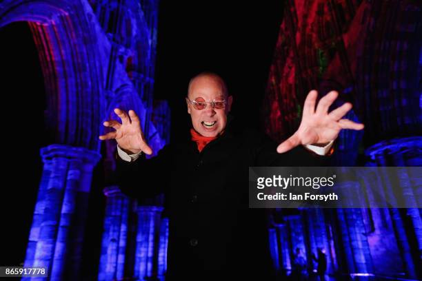 Richard Hollick plays Dracula during a spectacular light display illuminating the ruins of the historic Whitby Abbey on October 24, 2017 in Whitby,...