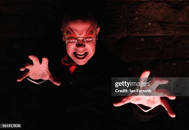 Richard Hollick plays Dracula during a spectacular light display illuminating the ruins of the historic Whitby Abbey on October 24, 2017 in Whitby,...