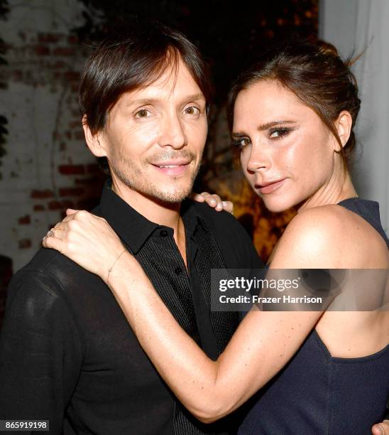 Ken Paves and Victoria Beckham at the grand opening of the new Ken Paves Salon hosted by Eva Longoria on October 23, 2017 in Los Angeles, California.