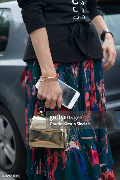 Director of partnerships and editorial coordinator for Olivia Palermo Jilian Magenheim wears a Zara jacket and belt, Max & Co skirt, Elena Ghisellini...