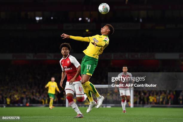 Arsenal's English midfielder Reiss Nelson vies with Norwich City's English midfielder Josh Murphy during the English League Cup fourth round football...