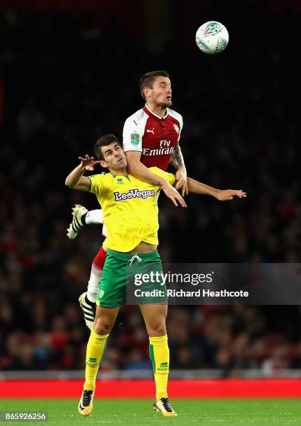 Nelson Oliveira of Norwich City and Mathieu Debuchy of Arsenal in action during the Carabao Cup Fourth Round match between Arsenal and Norwich City...