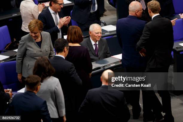 Newly-elected Bundestag President Wolfgang Schaeuble receives the congratulations of colleagues shortly after he was elected at the opening session...