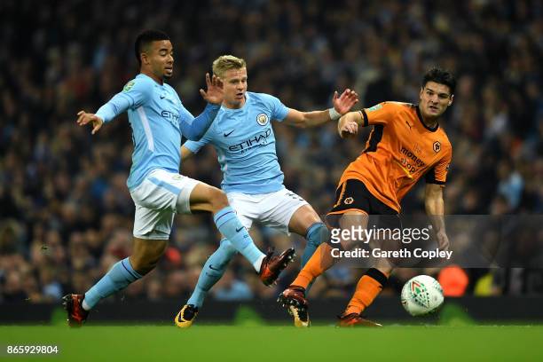 Gabriel Jesus and Alexander Zinchenko of Manchester City chase down Ben Marshall of Wolverhampton Wanderers during the Carabao Cup Fourth Round match...