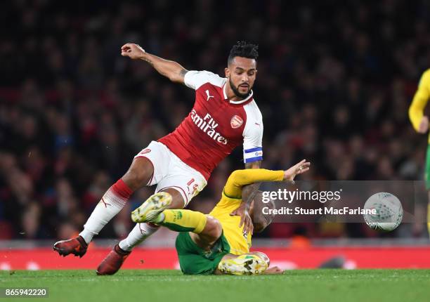 Theo Walcott of Arsenal challenged by Tom Trybull of Norwich during the Carabao Cup Fourth Round match between Arsenal and Norwich City at Emirates...