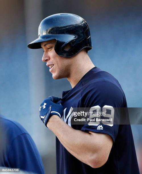 Aaron Judge of the New York Yankees watches batting practice before game 5 of the American League Championship Series against the Houston Astros on...