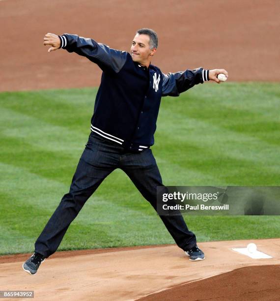 Former Yankee pitcher Andy Pettitte throws out the ceremonial first pitch before game 5 of the American League Championship Series between the...