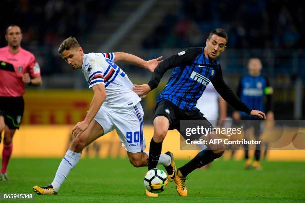 Sampdoria's Uruguayan midfielder Gaston Ramirez vies with Inter Milan's Uruguayan midfielder Matias Vecino during the Italian Serie A football match...