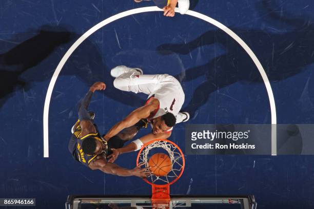 Victor Oladipo of the Indiana Pacers dunks the ball against Evan Turner of the Portland Trail Blazers on October 20, 2017 at Bankers Life Fieldhouse...