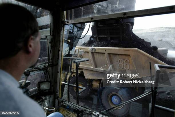 An electric shovel operator loads a coal hauling truck with 200 tons of coal at the Buckskin Coal Mine 12 miles north of Gillette, Wyoming, May 6,...