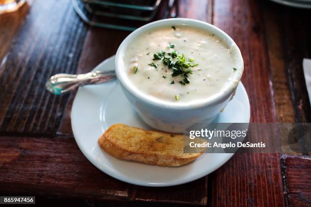 clam chowder in a small cup - chowder bildbanksfoton och bilder