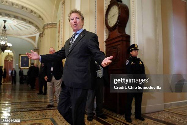 Sen. Rand Paul gestures toward reporters following the weekly Republican policy luncheon at the U.S. Capitol October 24, 2017 in Washington, DC. Pau...