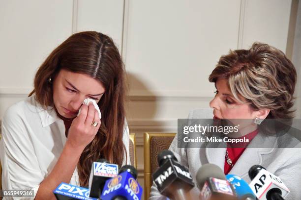 New alleged victim of Harvey Weinstein, Mimi Haleyi wipe away a tear at a press conference held by Attorney Gloria Allred at Lotte New York Palace on...