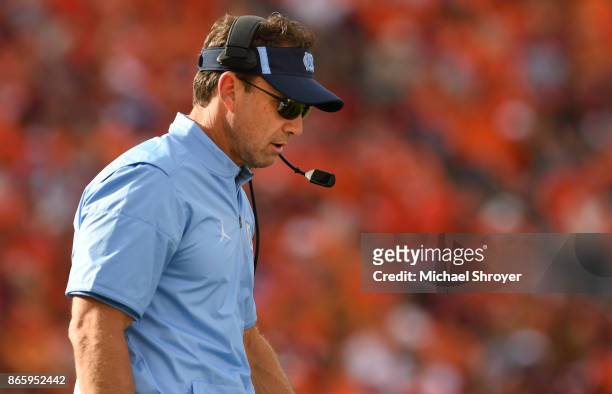 Head coach Larry Fedora of the North Carolina Tar Heels reacts during the game against the Virginia Tech Hokies at Lane Stadium on October 21, 2017...