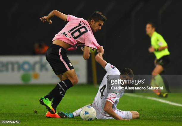 Ivaylo Chochev of US Citta di Palermo competes for the ball whit Alessio Sabbione of FC Carpi during the Serie B match between FC Carpi and US Citta...