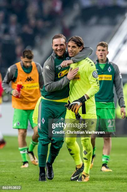 Tobias Sippel and Yann Sommer of Borussia Moenchengladbach celebrate winning the DFB Cup match between Fortuna Duesseldorf and Borussia...