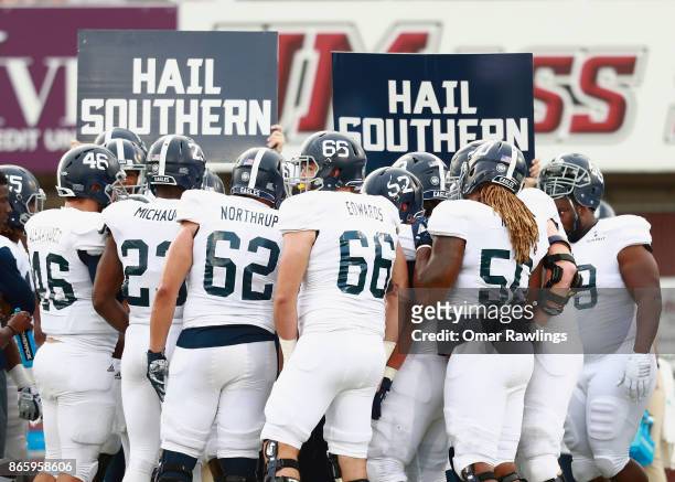 The Georgia Southern Eagles huddle during the game against the Massachusetts Minutemen at McGuirk Alumni Staium on October 21, 2017 in Hadley,...