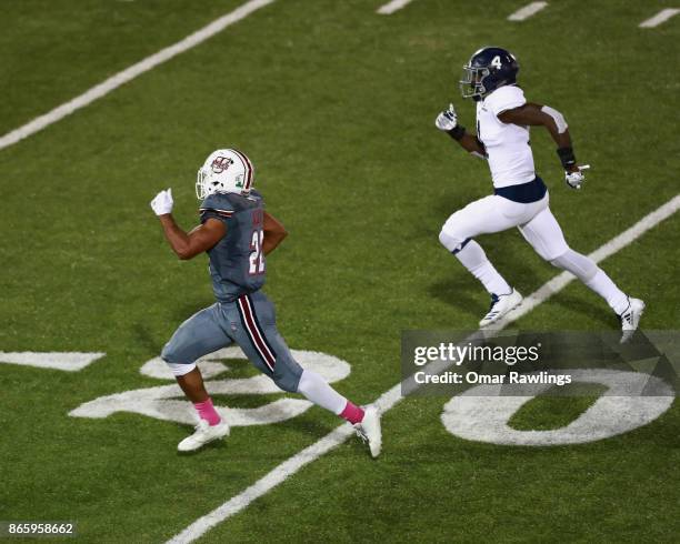 Wider receiver Bilal Ally of the Massachusetts Minutemen runs in for touchdown during the second half of the game against the Georgia Southern Eagles...