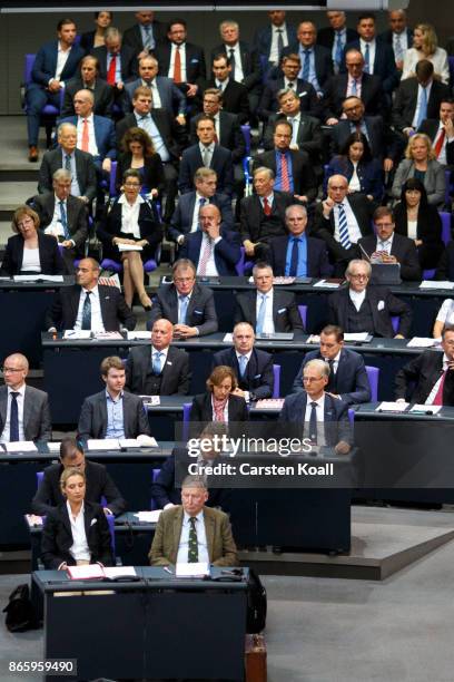 Members of the right-wing Alternative for Germany faction attend the opening session of the new Bundestag on October 24, 2017 in Berlin, Germany....