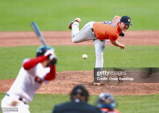 Will Harris of the Houston Astros pitches during the game against the Boston Red Sox at Fenway Park on October 1, 2017 in Boston, Massachusetts.