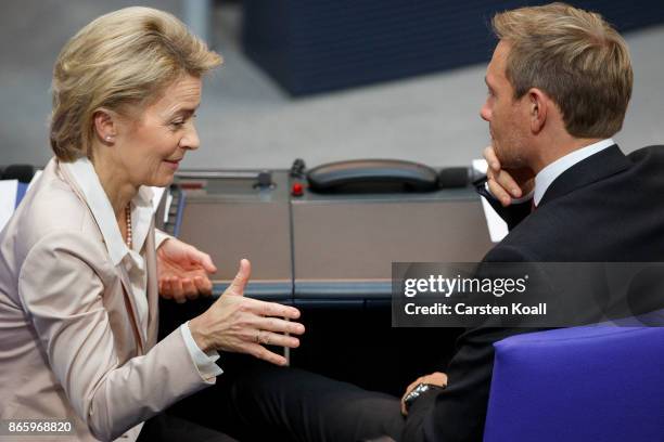 Christian Lindner of the Free Democratic Party and German Defense Minister Ursula von der Leyen of the German Christian Democrats chat during the...