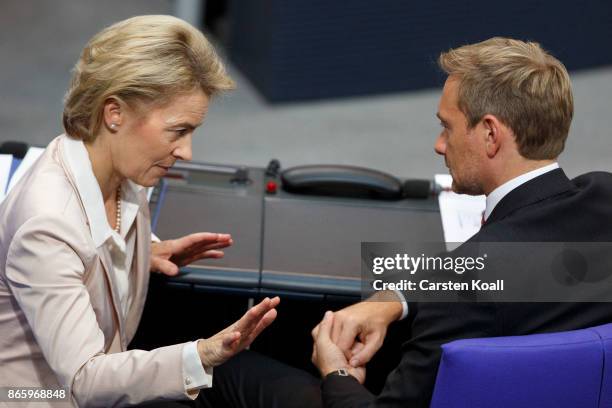 Christian Lindner of the Free Democratic Party and German Defense Minister Ursula von der Leyen of the German Christian Democrats chat during the...