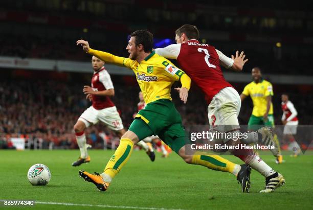 Mathieu Debuchy of Arsenal brings down James Husband of Norwich City in the box during the Carabao Cup Fourth Round match between Arsenal and Norwich...