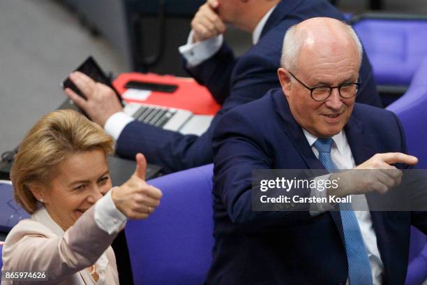 Volker Kauder , leader of the CDU/CSU Bundestag faction and German Defense Minister Ursula von der Leyen of the German Christian Democrats gesture...