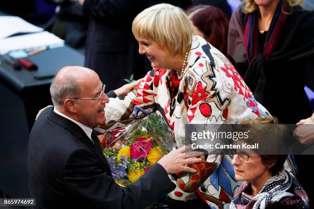Newly-elected Bundestag Vice-President Claudia Rot receives the congratulation of faction member of the the German left- party Gregor Gysi shortly...