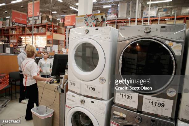Whirlpool appliances are offered for sale alongside other brands at a Home Depot store on October 24, 2017 in Chicago, Illinois. Sears Holdings...