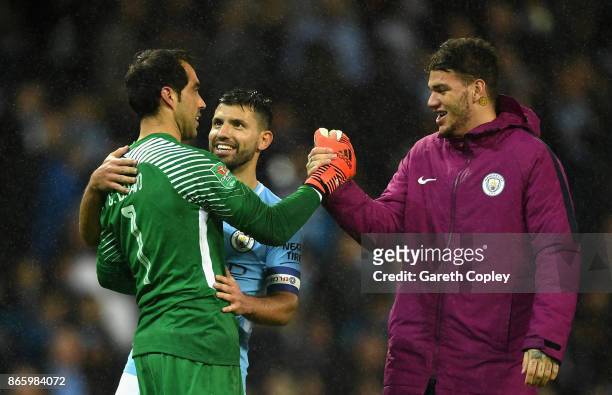 Claudio Bravo, Sergio Aguero and Ederson of Manchester City celebrate their win during the Carabao Cup Fourth Round match between Manchester City and...