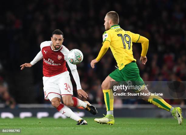 Francis Coquelin of Arsenal challenges Tom Trybull of Norwich during the Carabao Cup Fourth Round match between Arsenal and Norwich City at Emirates...