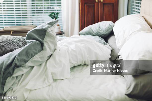 slept in bed - bedding stock pictures, royalty-free photos & images