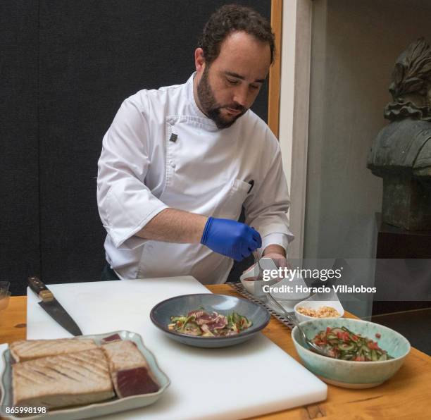 Portuguese Chef Luis Rodrigues prepares Tuna tataki with peanuts kaffir lime and avocado, a local dish included in Small Luxury Hotels of the World...