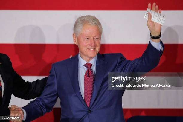 Former president Bill Clinton waves to people during a rally in support of Democratic candidate Phil Murphy, who is running for the governor of New...