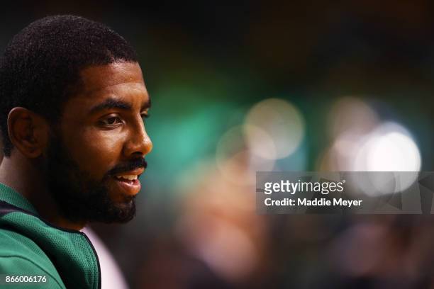 Kyrie Irving of the Boston Celtics looks on during warm ups before the game against the New York Knicks at TD Garden on October 24, 2017 in Boston,...