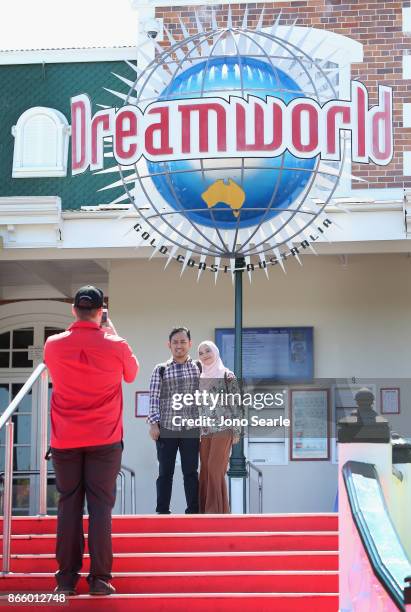 Visitors have their photo taken at Dreamworld on October 25, 2017 in Gold Coast, Australia. Four people were killed following an accident on the...