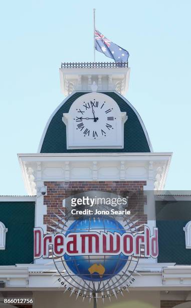 The Australian flag can be seen at half-mast at the entrance to Dreamworld on October 25, 2017 in Gold Coast, Australia. Four people were killed...