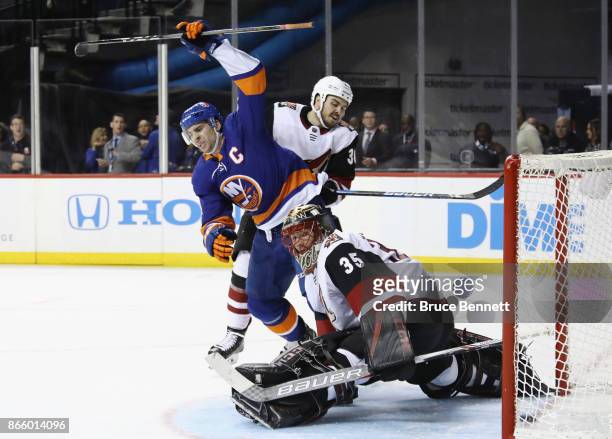 John Tavares of the New York Islanders celebrates his goal at 14:25 of the second period against Louis Domingue of the Arizona Coyotes at the...