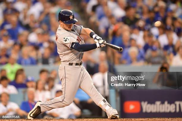 Alex Bregman of the Houston Astros hits a solo home run during the fourth inning against the Los Angeles Dodgers in game one of the 2017 World Series...