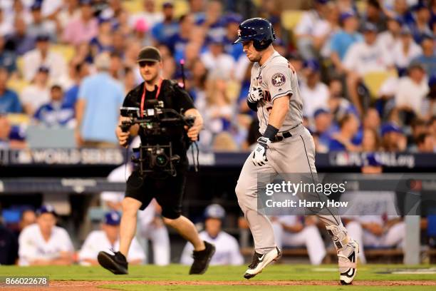 Alex Bregman of the Houston Astros runs the bases after hitting a solo home run during the fourth inning against the Los Angeles Dodgers in game one...