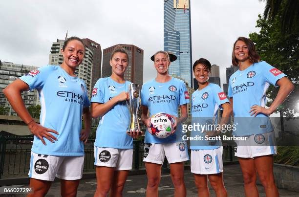 Kyah Simon, Steph Catley, Alanna Kennedy, Yukari Kinga and Ashley Hatch of Melbourne City Womens team pose with the W-League trophy during a...