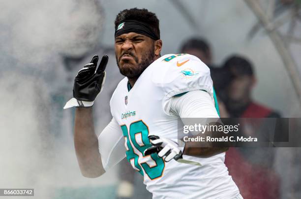 Tight end Julius Thomas of the Miami Dolphins enters the field before a NFL game against the New York Jets at Hard Rock Stadium on October 22, 2017...