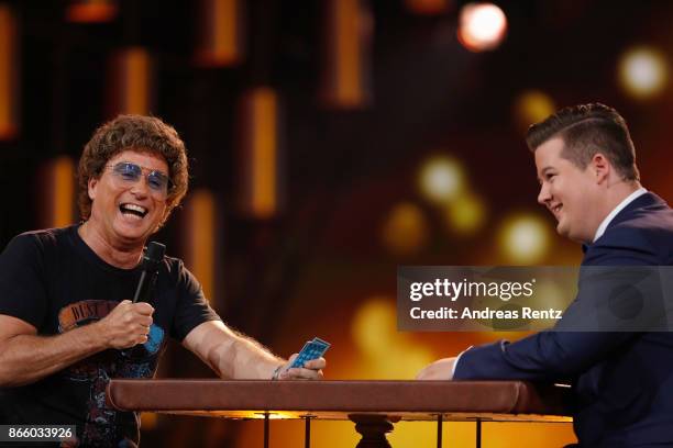 Atze Schroeder and Chris Tall gesture during the 21st Annual German Comedy Awards on October 24, 2017 in Cologne, Germany