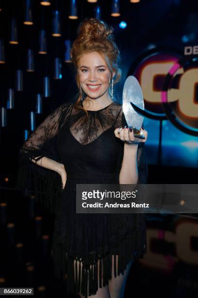 Palina Rojinski receives her award for 'Best Cinema Comedy' during the 21st Annual German Comedy Awards on October 24, 2017 in Cologne, Germany