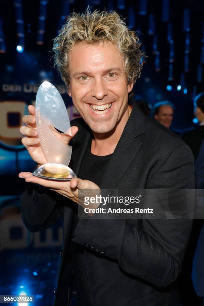Sascha Grammel poses with his award for 'Best TV-Program' during the 21st Annual German Comedy Awards on October 24, 2017 in Cologne, Germany