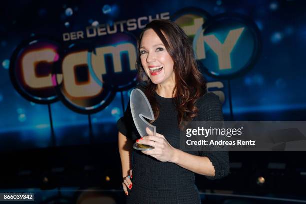 Carolin Kebekus poses with her award as 'Best Comedian' during the 21st Annual German Comedy Awards on October 24, 2017 in Cologne, Germany