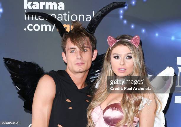 Reality TV Personality James Kennedy and Raquel Levis attend the 2017 Maxim Halloween party at Los Angeles Center Studios on October 21, 2017 in Los...