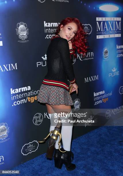 Dancer / TV Personality Sharna Burgess attends the 2017 Maxim Halloween party at Los Angeles Center Studios on October 21, 2017 in Los Angeles,...