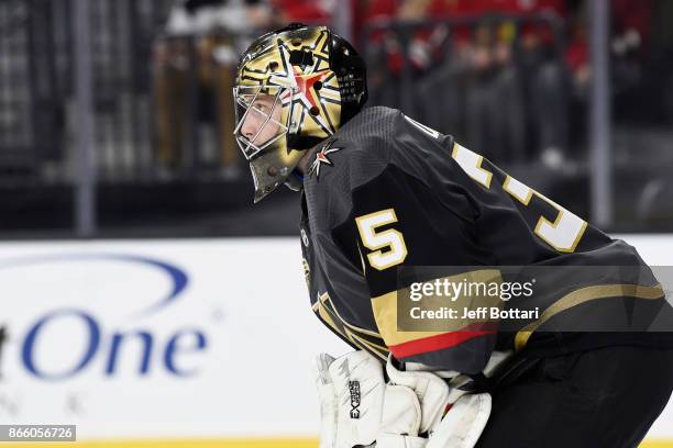 Oscar Dansk of the Vegas Golden Knights defends his goal against the Chicago Blackhawks during the game at T-Mobile Arena on October 24, 2017 in Las...